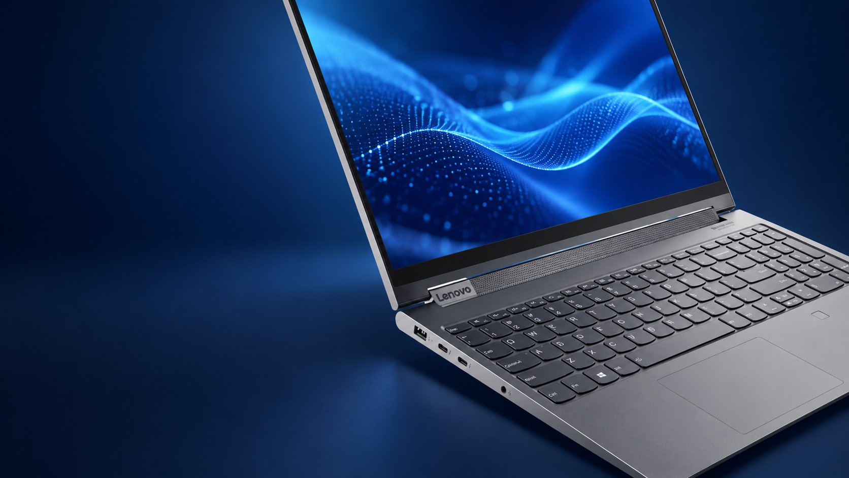 Business laptop displaying a blue digital network graphic