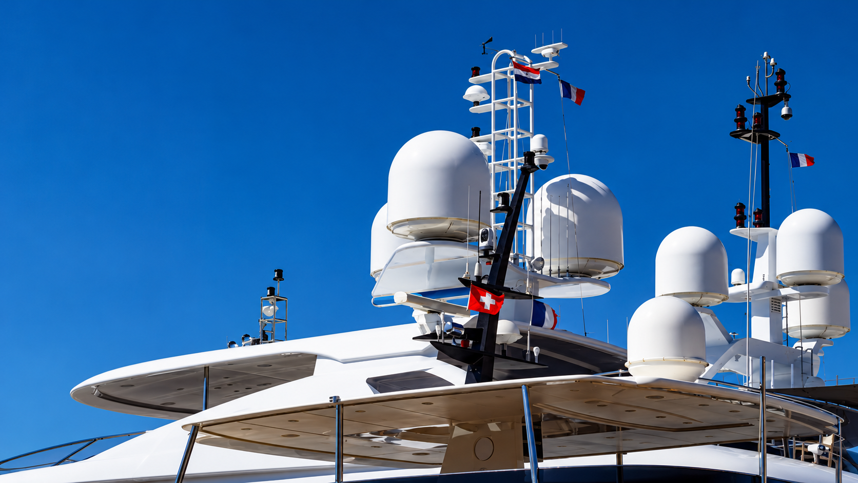 Satellite communications equipment against a blue sky